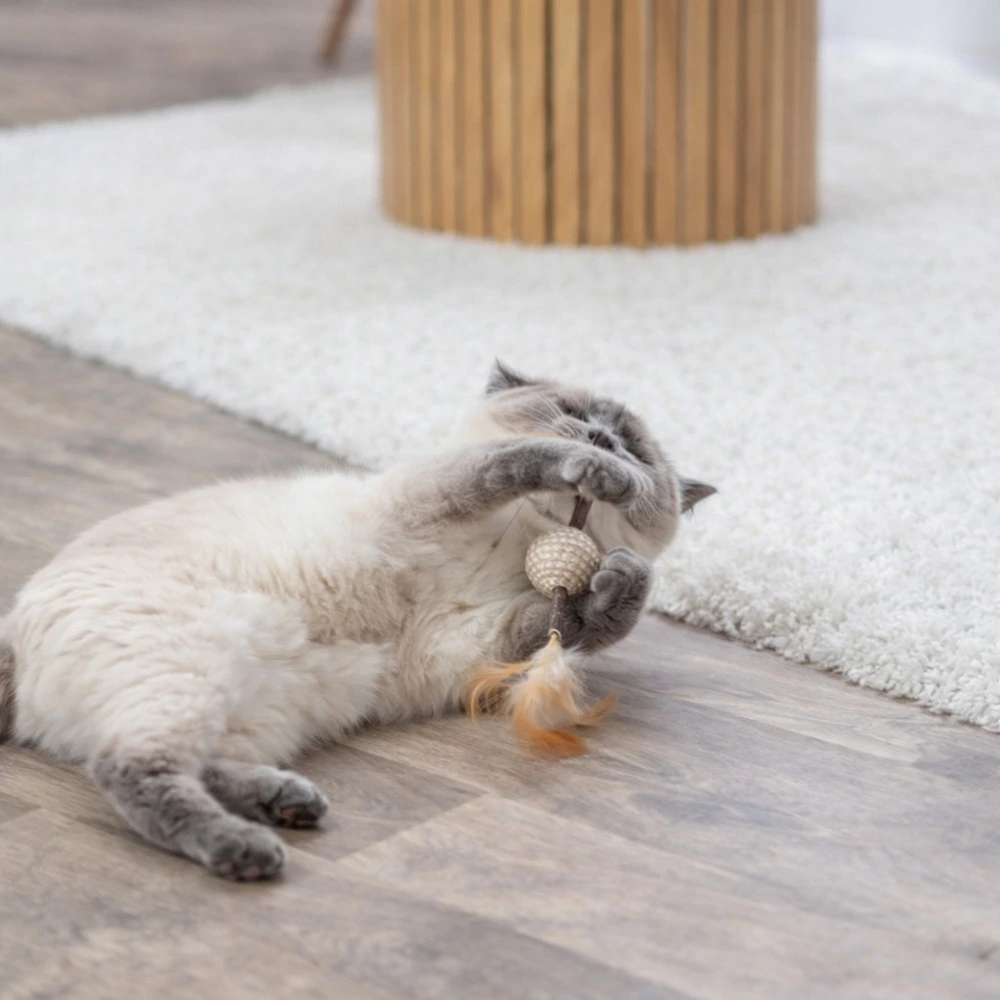 Іграшка Trixie для котів м яч на паличці з пір ям джут 20 см